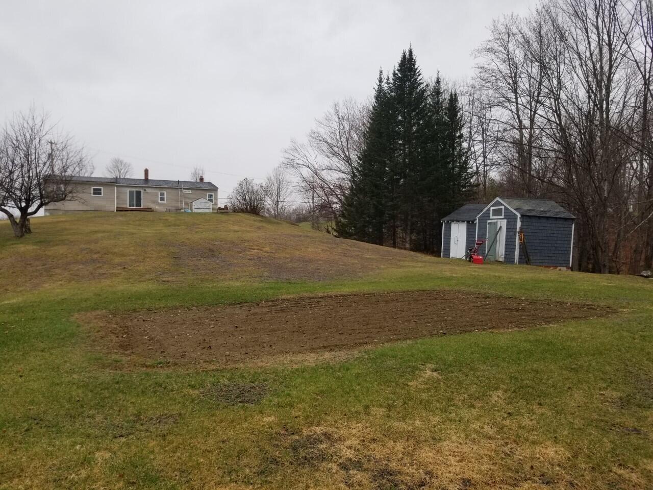 191 Weld Road Wilton, ME 04294 - Photo 3 of 32 0361 behind home garden area