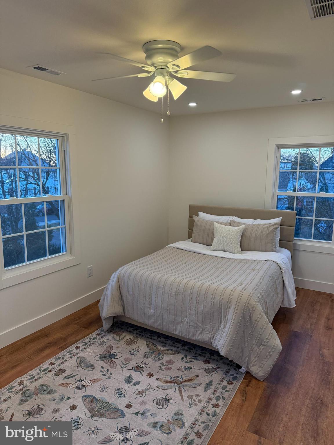 202 Chestnut Street Brooklawn, NJ 08030 - Photo 21 of 29 a bedroom with a bed and a window