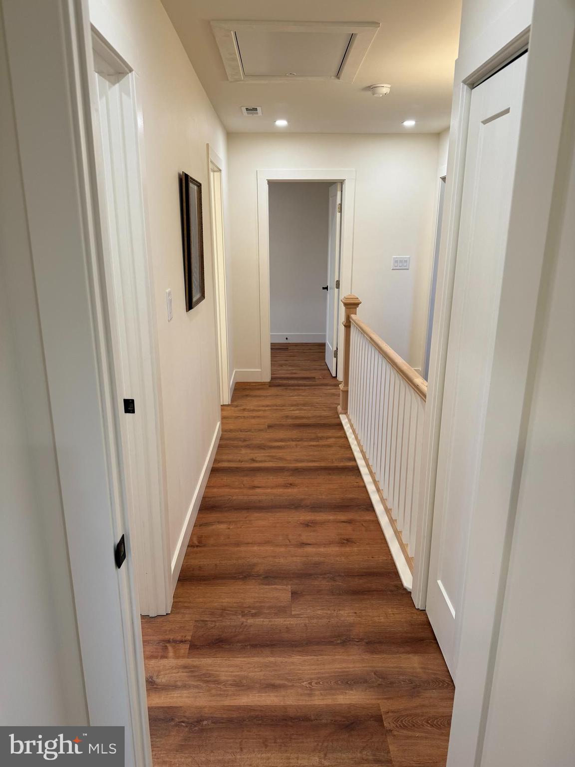 202 Chestnut Street Brooklawn, NJ 08030 - Photo 24 of 29 a view of a hallway with wooden floor and staircase