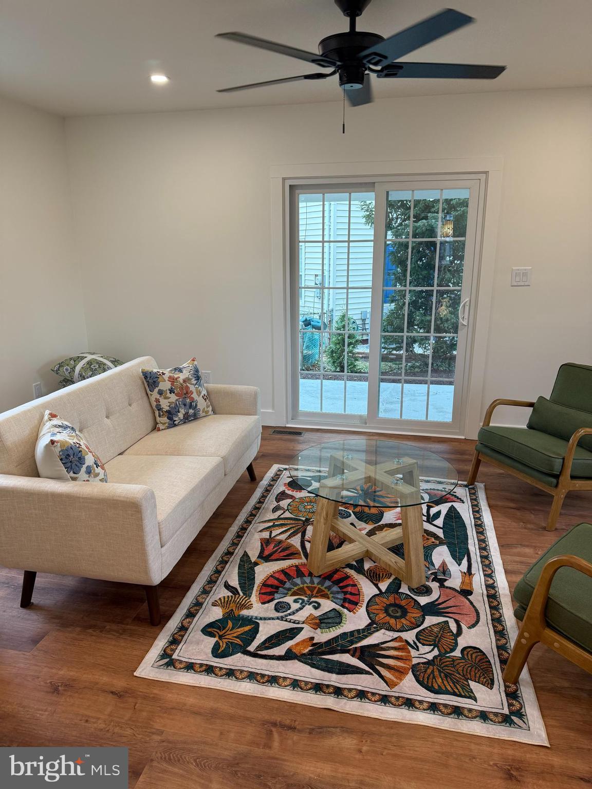 202 Chestnut Street Brooklawn, NJ 08030 - Photo 3 of 29 a living room with a rug and a rug
