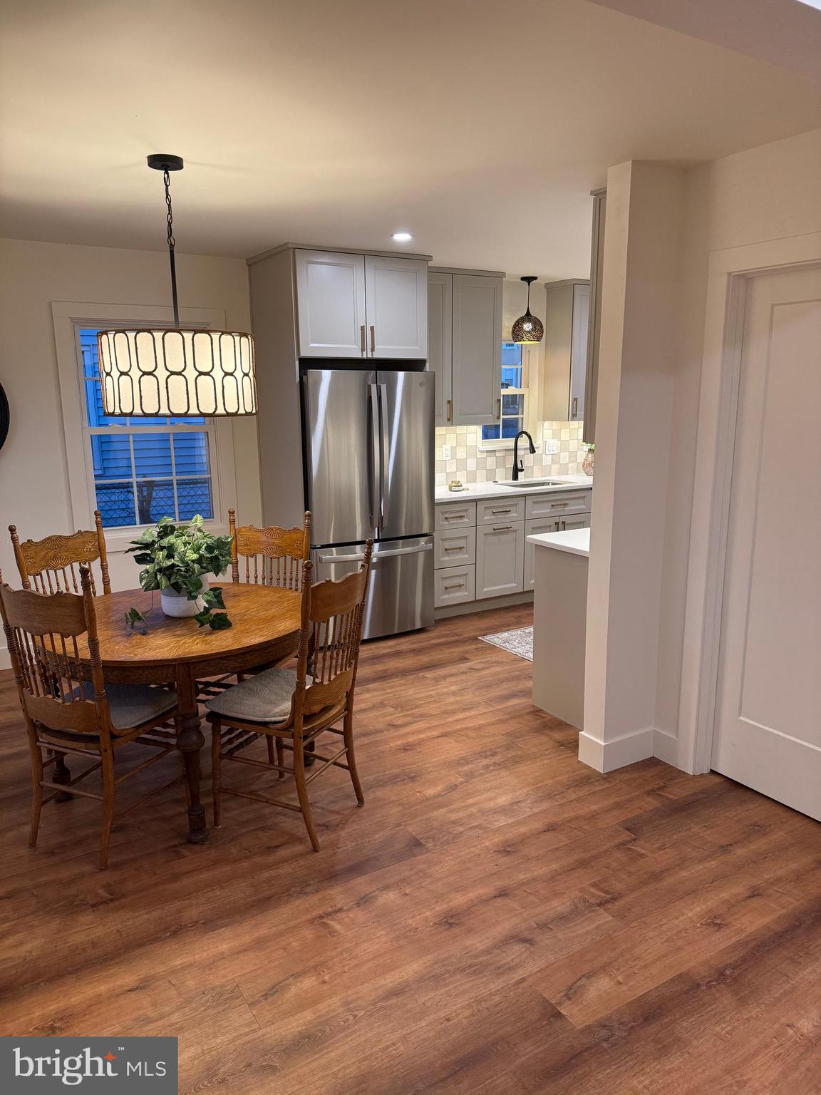 202 Chestnut Street Brooklawn, NJ 08030 - Photo 7 of 29 a view of a dining room with furniture window and wooden floor