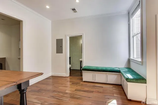 a living room with a rug