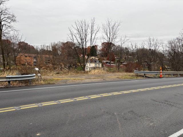 a view of a street with houses