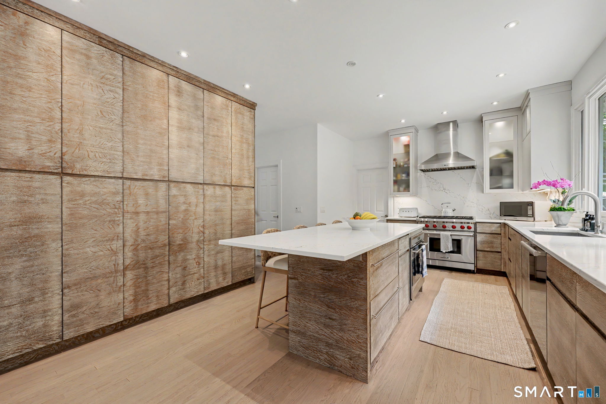 10 Side Hill Road Westport, CT 06880 - Photo 7 of 40 a kitchen with a sink stainless steel appliances and counter space