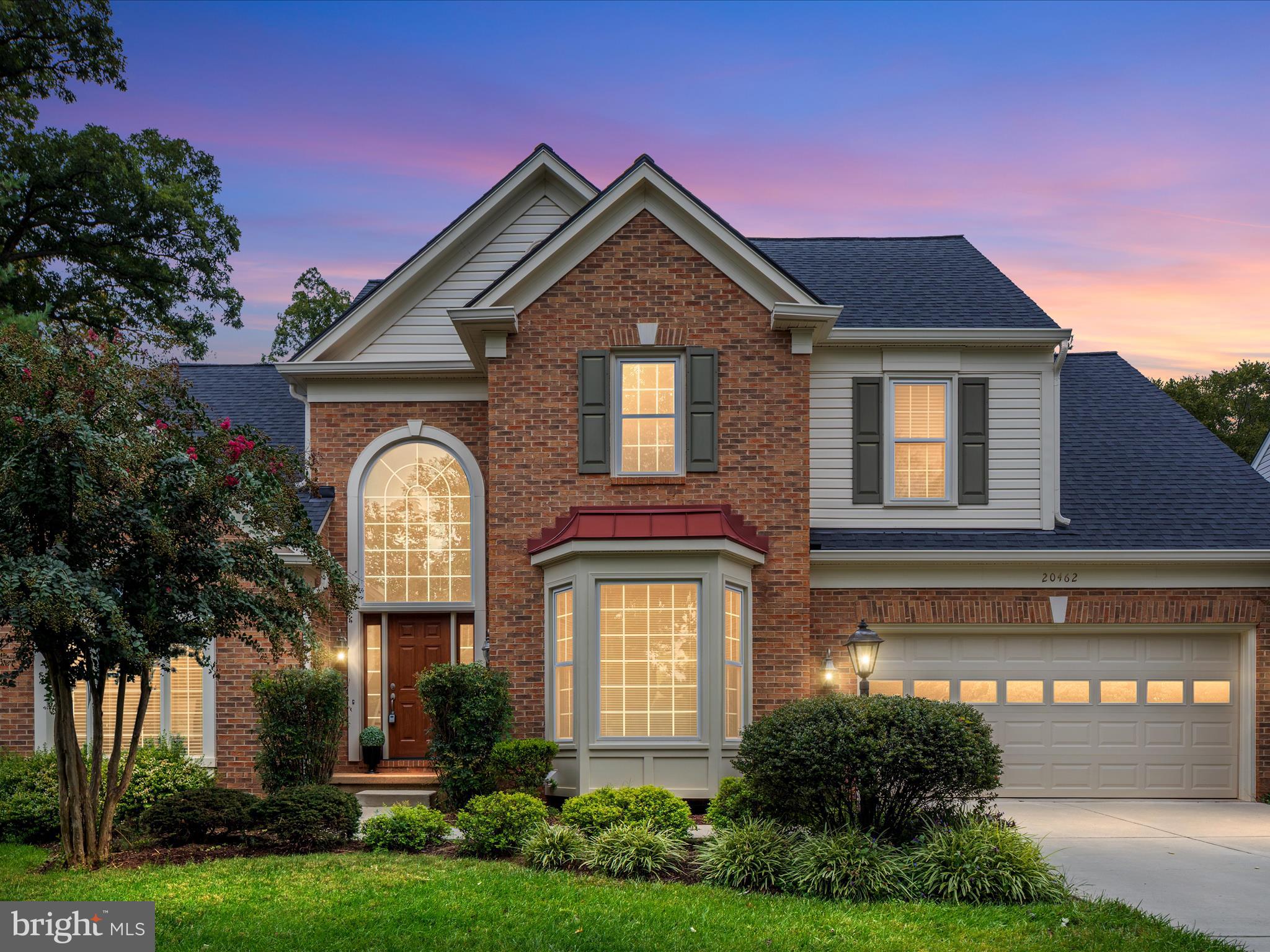 20462 Quarterpath Trace Circle Sterling, VA 20165 - Photo 2 of 58 a front view of a house with a yard