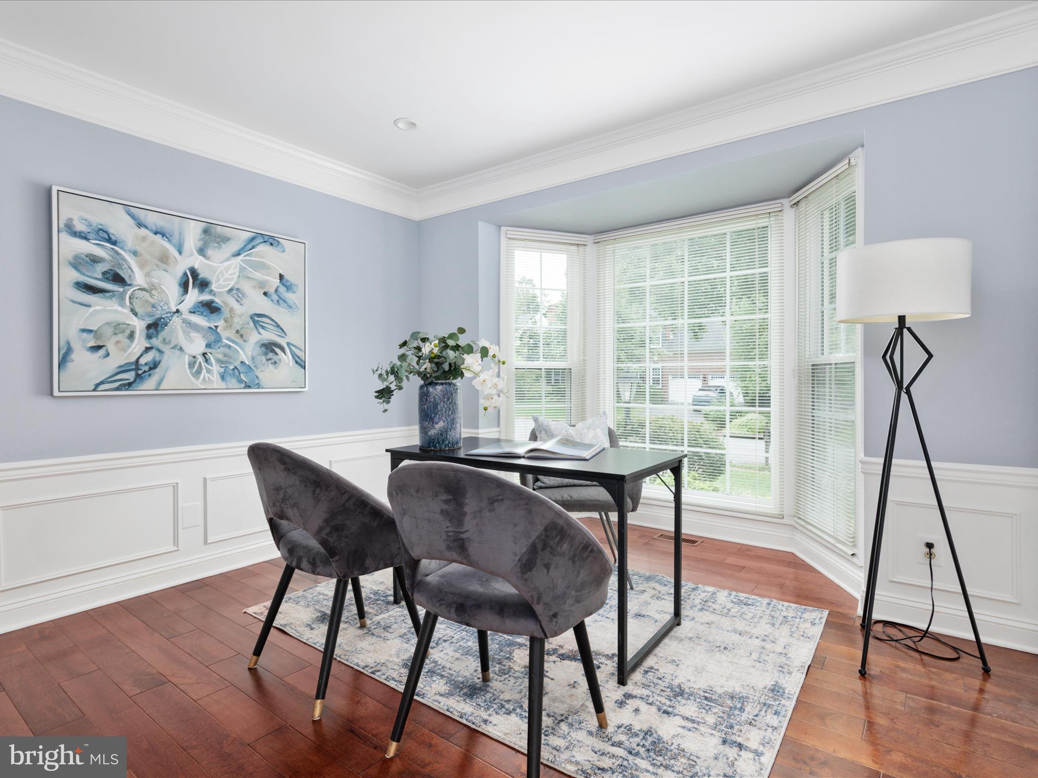 20462 Quarterpath Trace Circle Sterling, VA 20165 - Photo 23 of 58 a view of a dining room with furniture window and wooden floor
