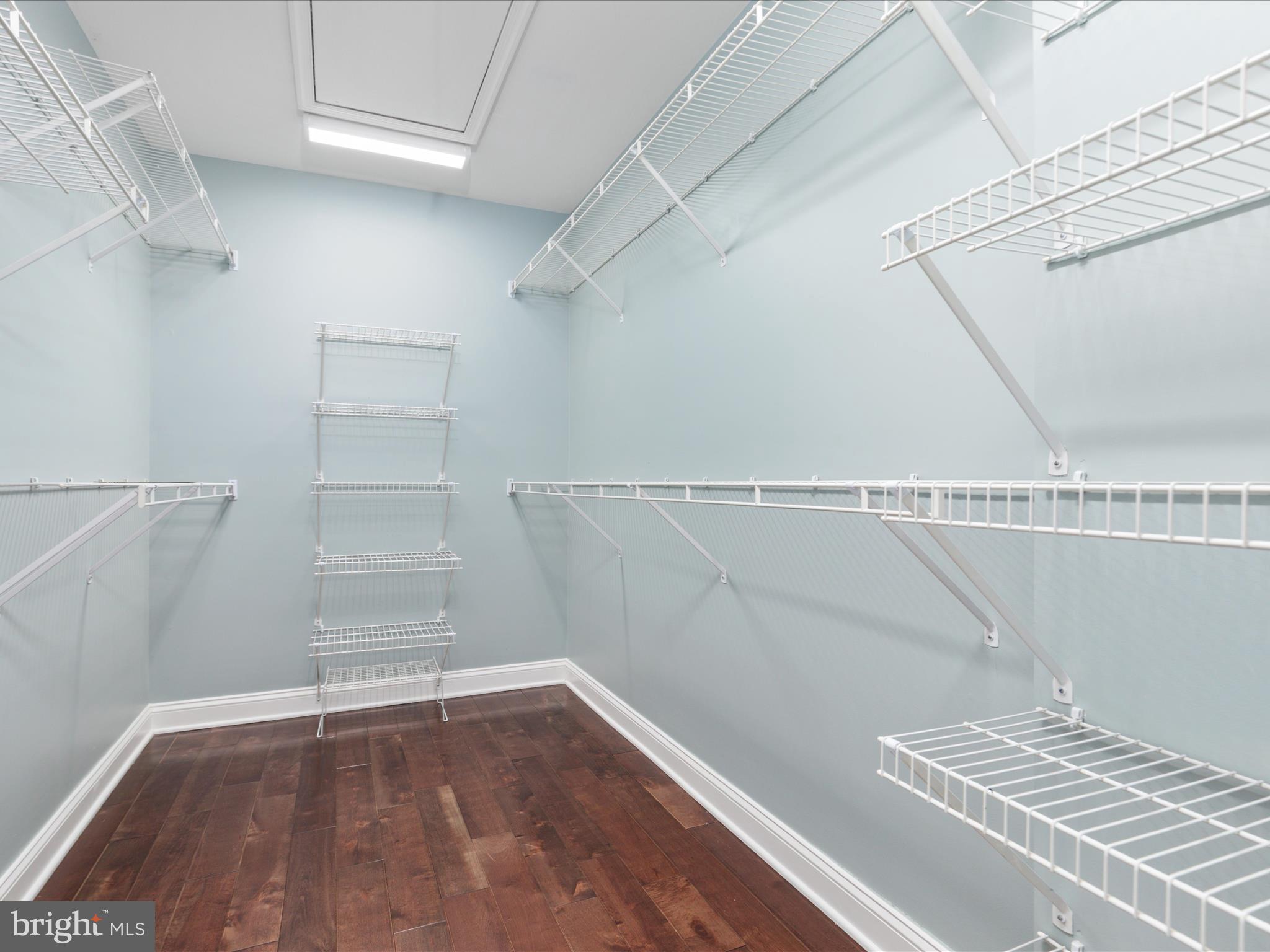 20462 Quarterpath Trace Circle Sterling, VA 20165 - Photo 31 of 58 a view of a room with racks on the wall