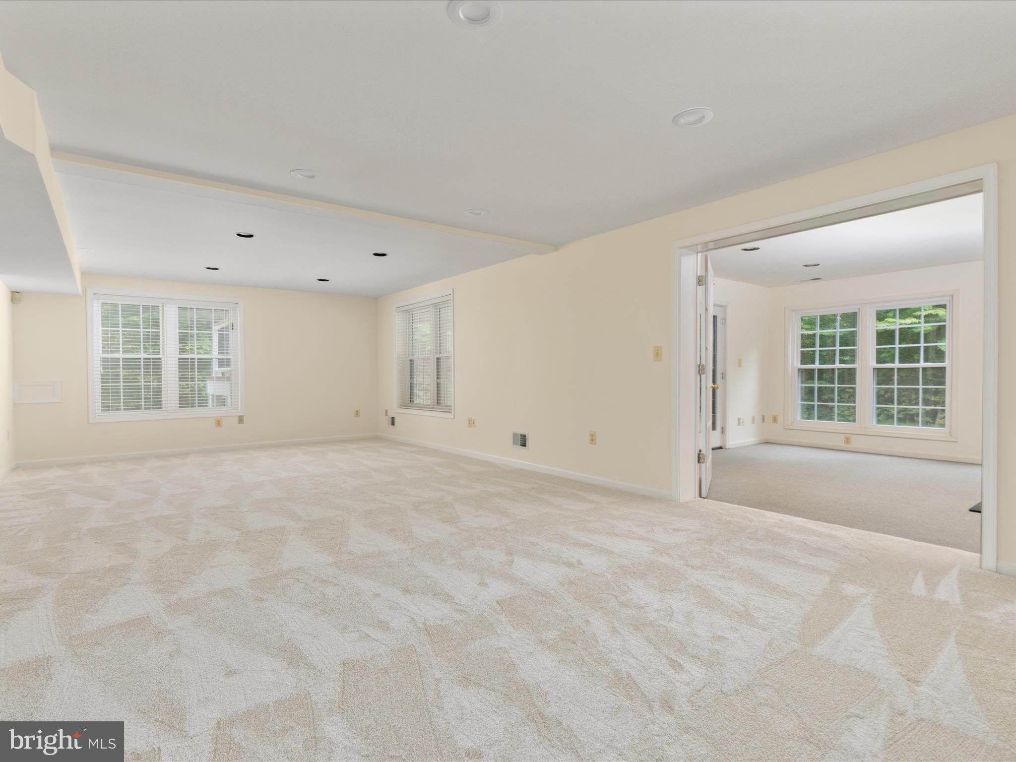 20462 Quarterpath Trace Circle Sterling, VA 20165 - Photo 40 of 58 a view of an empty room with a window