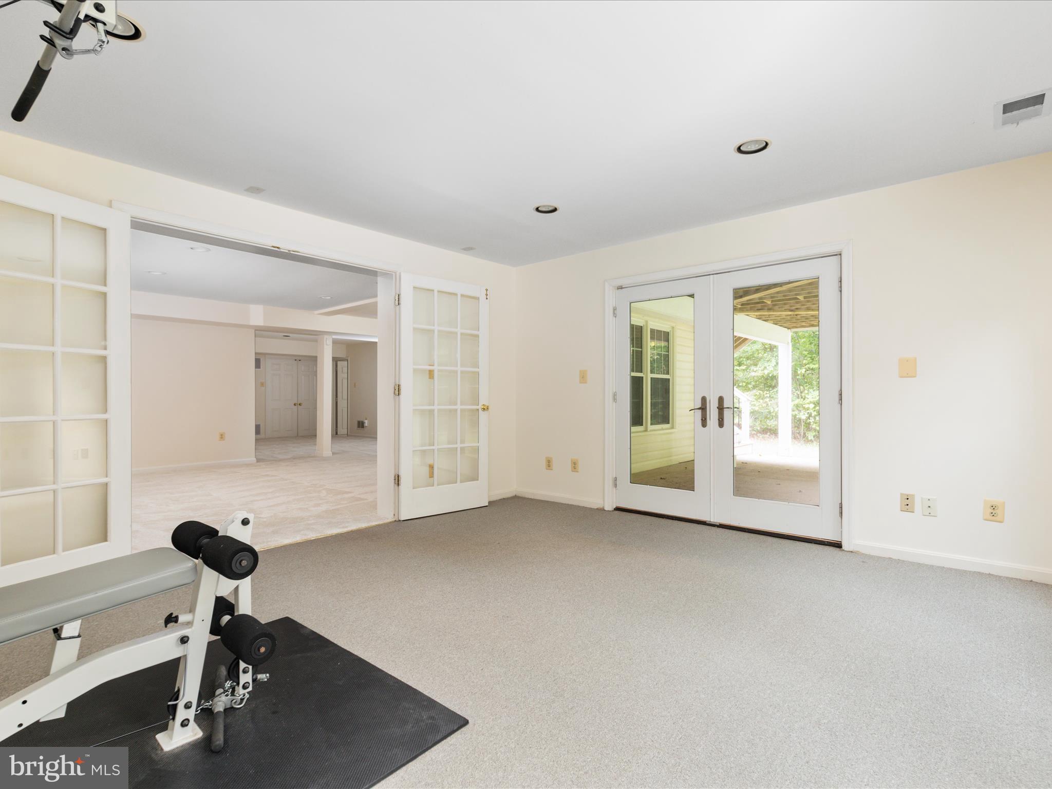 20462 Quarterpath Trace Circle Sterling, VA 20165 - Photo 42 of 58 a view of an empty room with a window
