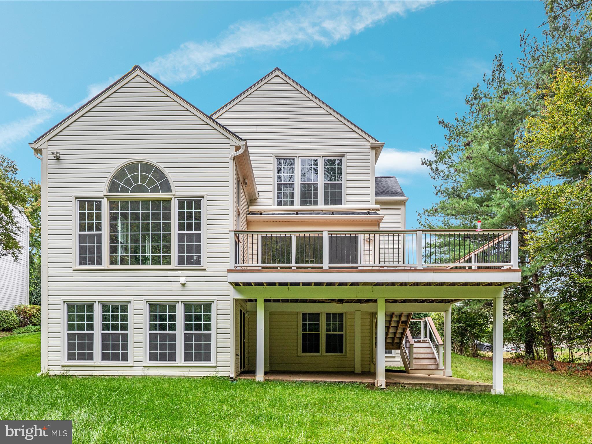 20462 Quarterpath Trace Circle Sterling, VA 20165 - Photo 55 of 58 a front view of a house with a yard