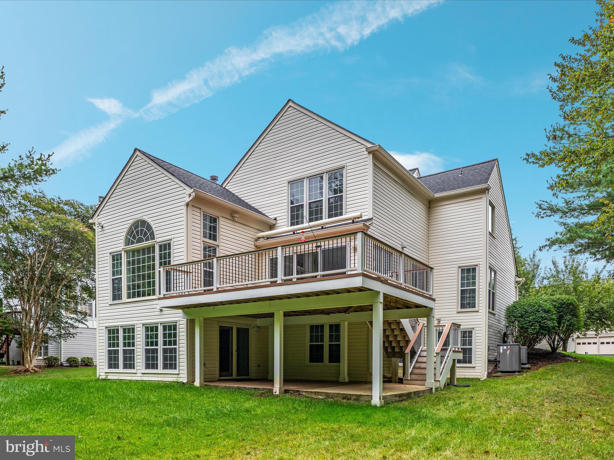 20462 Quarterpath Trace Circle Sterling, VA 20165 - Photo 56 of 58 a view of a house with a yard