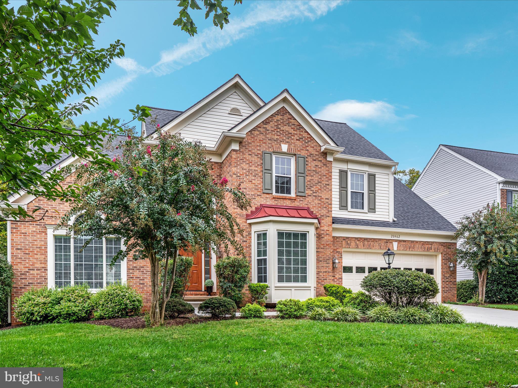 20462 Quarterpath Trace Circle Sterling, VA 20165 - Photo 57 of 58 front view of a house with a yard