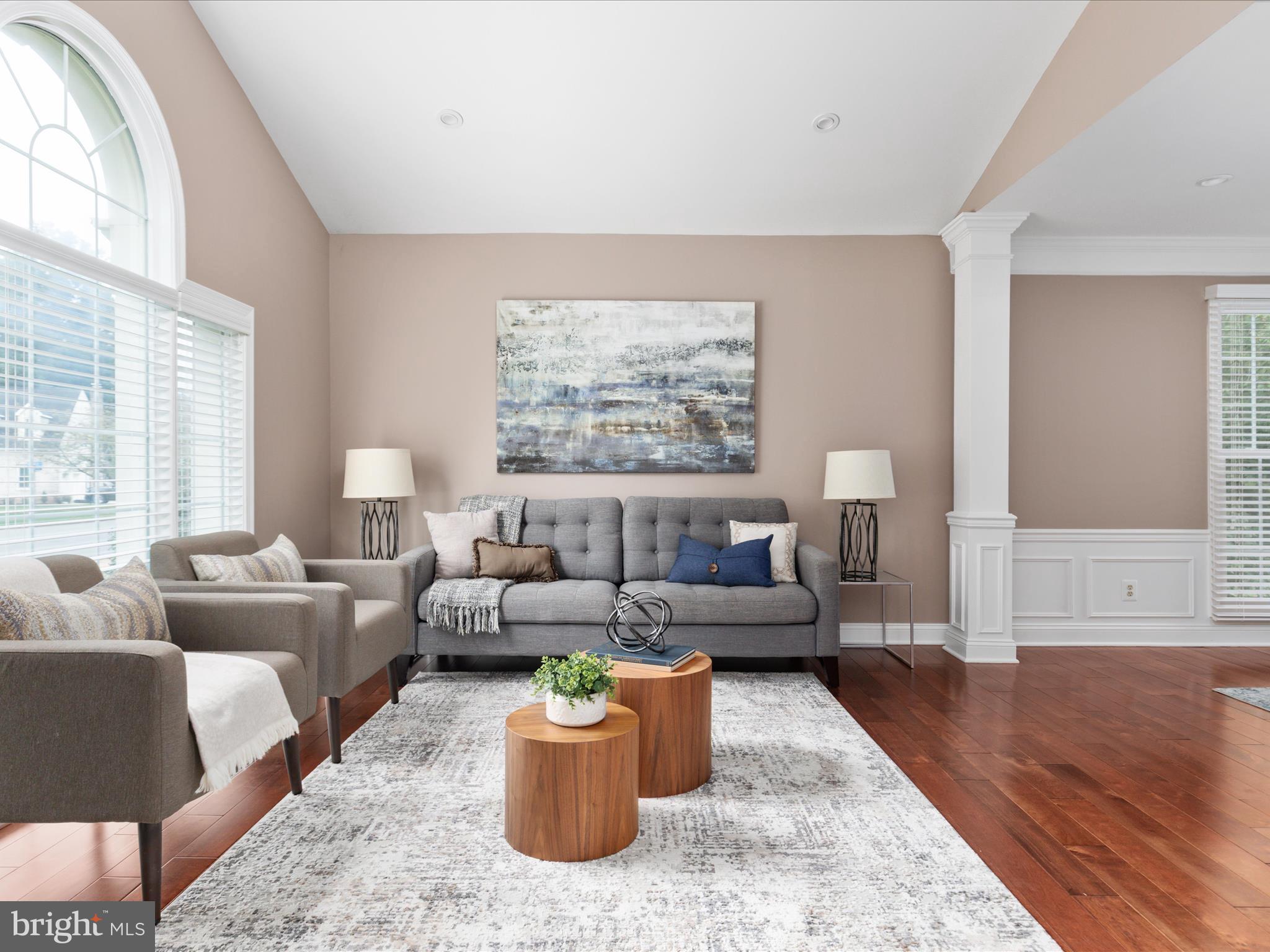 20462 Quarterpath Trace Circle Sterling, VA 20165 - Photo 7 of 58 a living room with furniture and a large window