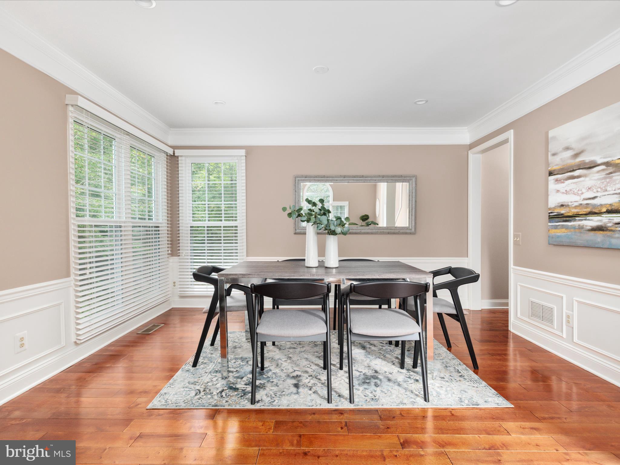 20462 Quarterpath Trace Circle Sterling, VA 20165 - Photo 9 of 58 a view of a dining room with furniture window and wooden floor