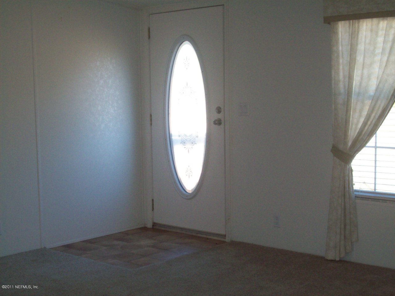 45128 Zidell Road Callahan, FL 32011 - Photo 7 of 12 an empty room with windows