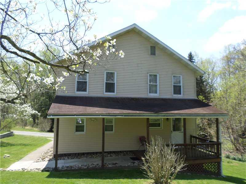 105 Allison Road Dilliner, PA 15327 - Photo 2 of 14 Exterior Back. Large rear covered deck and patio for entertaining family & friends