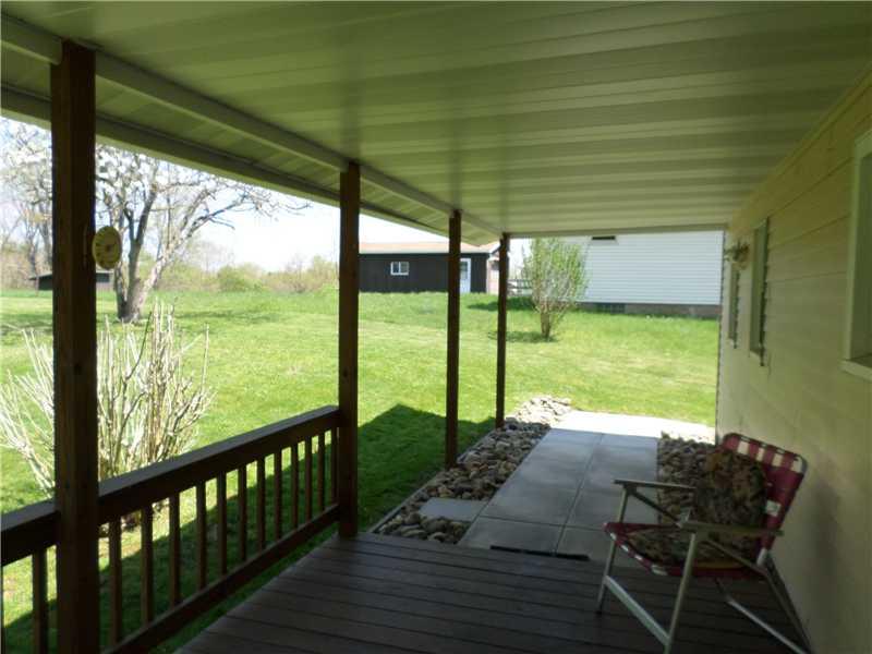 105 Allison Road Dilliner, PA 15327 - Photo 11 of 14 Patio/Deck. Rear covered picnic perfect deck and patio