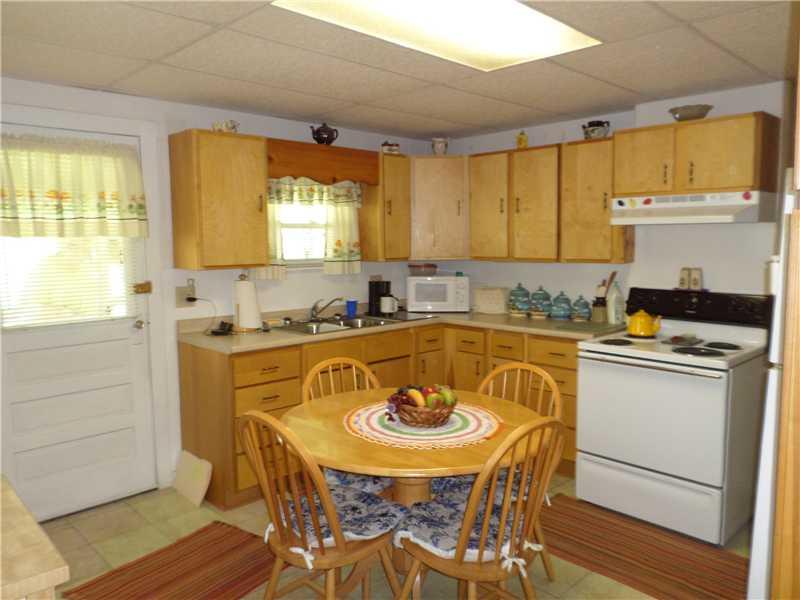 105 Allison Road Dilliner, PA 15327 - Photo 3 of 14 Kitchen. Lovely solid wood cabinetry eat-in kitchen with lots of cupboards space and counterspace