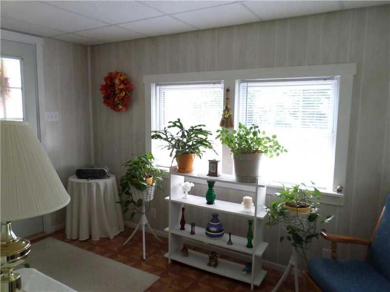 105 Allison Road Dilliner, PA 15327 - Photo 5 of 14 Sunroom. Pretty all seasons sun room - perfect place to read a book and plants to thrive