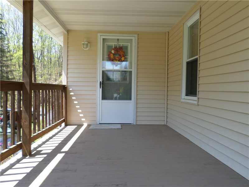 105 Allison Road Dilliner, PA 15327 - Photo 10 of 14 Patio/Deck. Front covered porch
