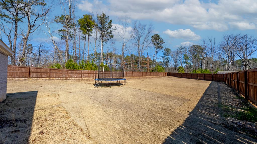 41 Loblolly Lane Fortson, GA 31808 - Photo 39 of 45 a view of pathway with a wrought fence
