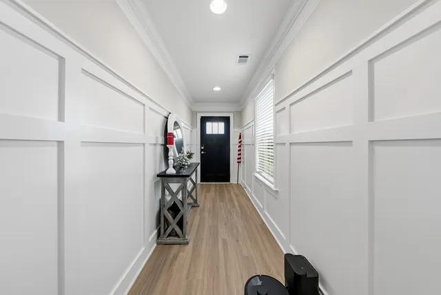 a view of entryway with wooden floor
