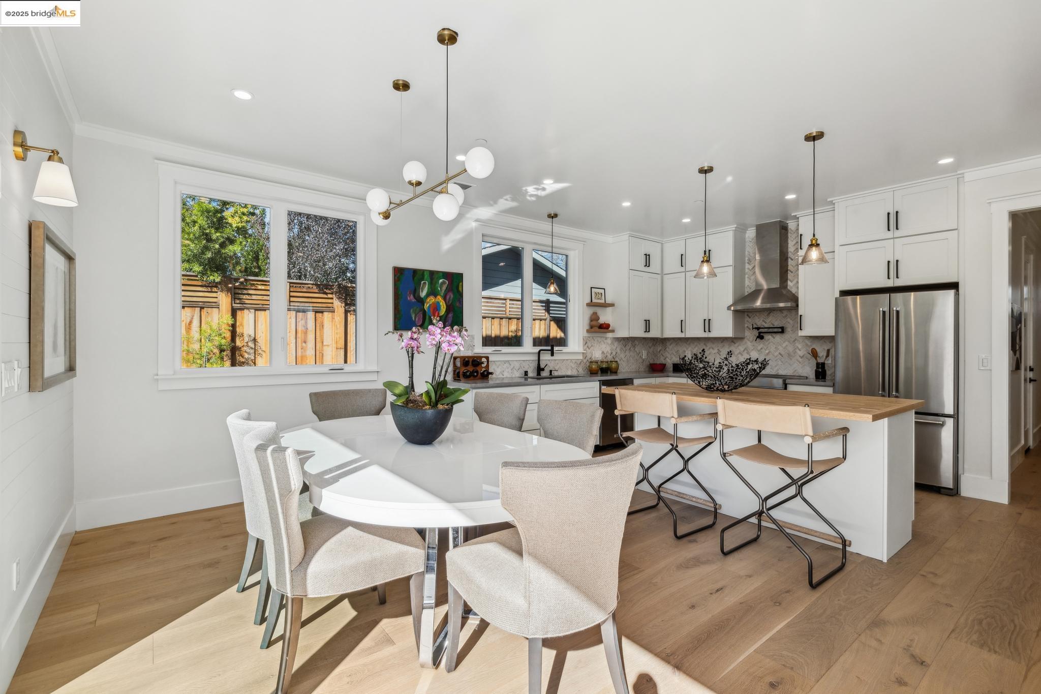2310 Eighth Street Berkeley, CA 94710 - Photo 12 of 44 a view of a dining room with furniture window and wooden floor