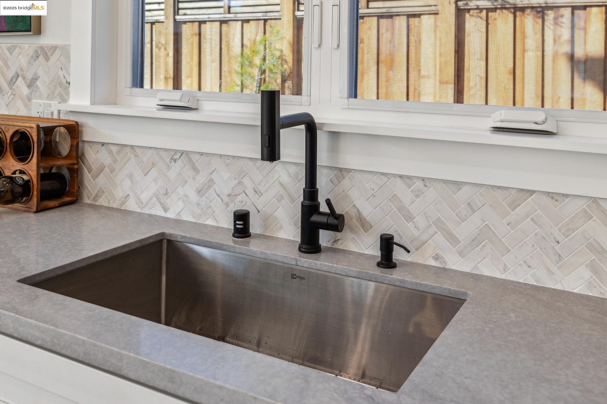 2310 Eighth Street Berkeley, CA 94710 - Photo 20 of 44 a kitchen with a sink and a window