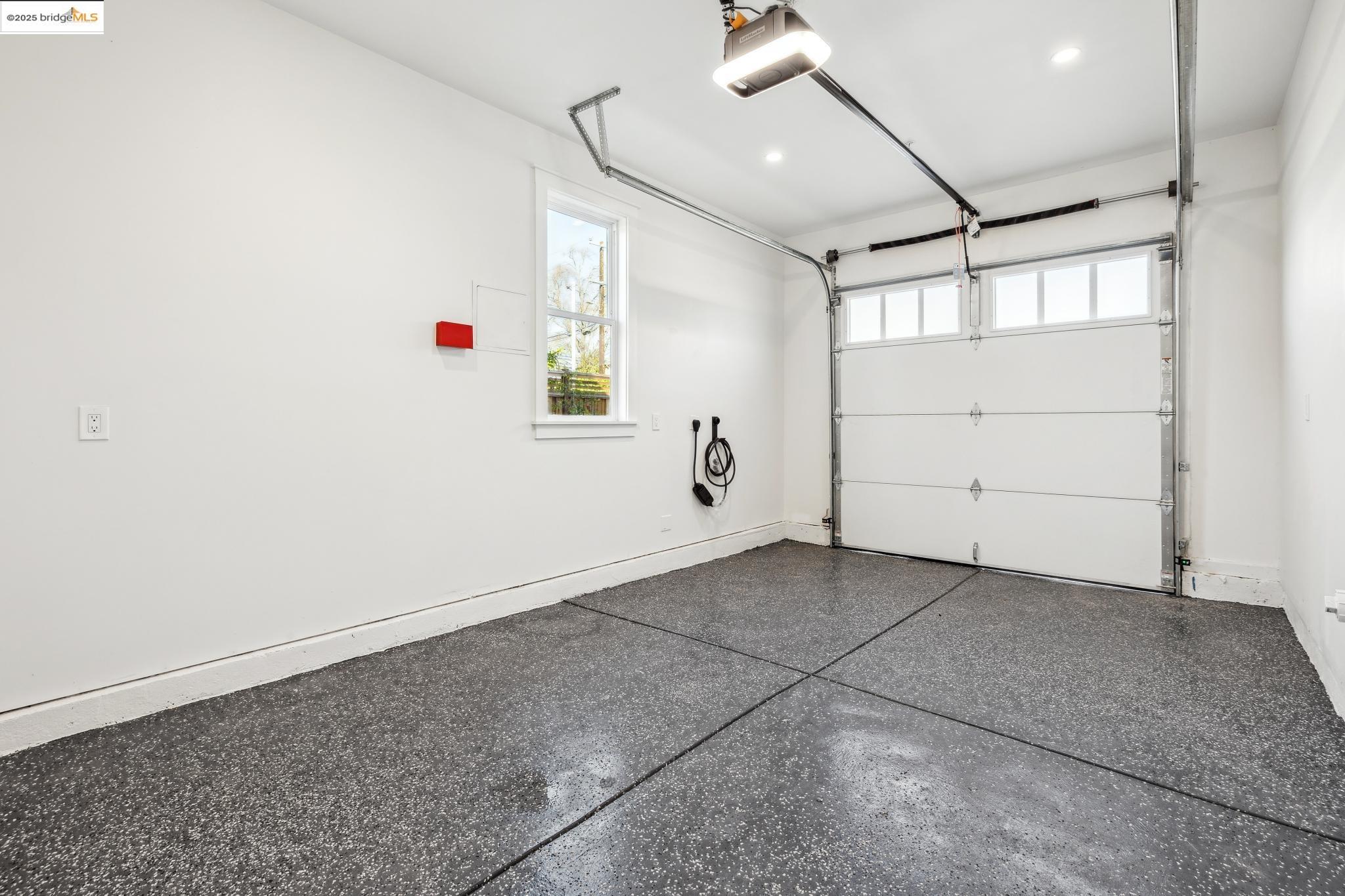 2310 Eighth Street Berkeley, CA 94710 - Photo 42 of 44 an empty room with windows and ceiling fan