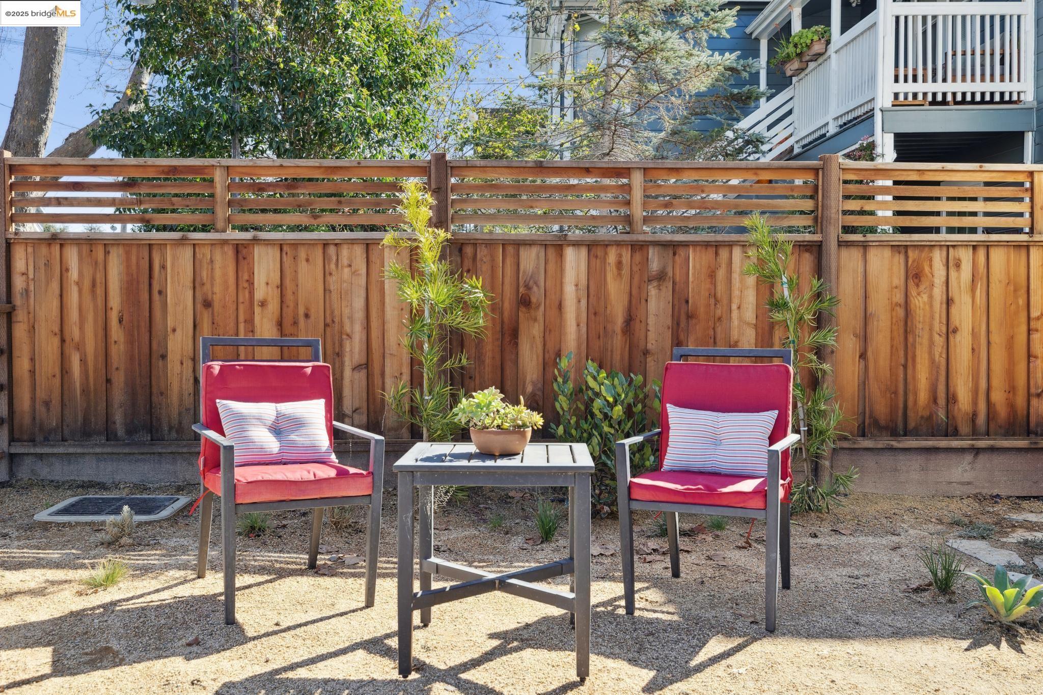 2310 Eighth Street Berkeley, CA 94710 - Photo 6 of 44 a wooden bench sitting in backside of a house