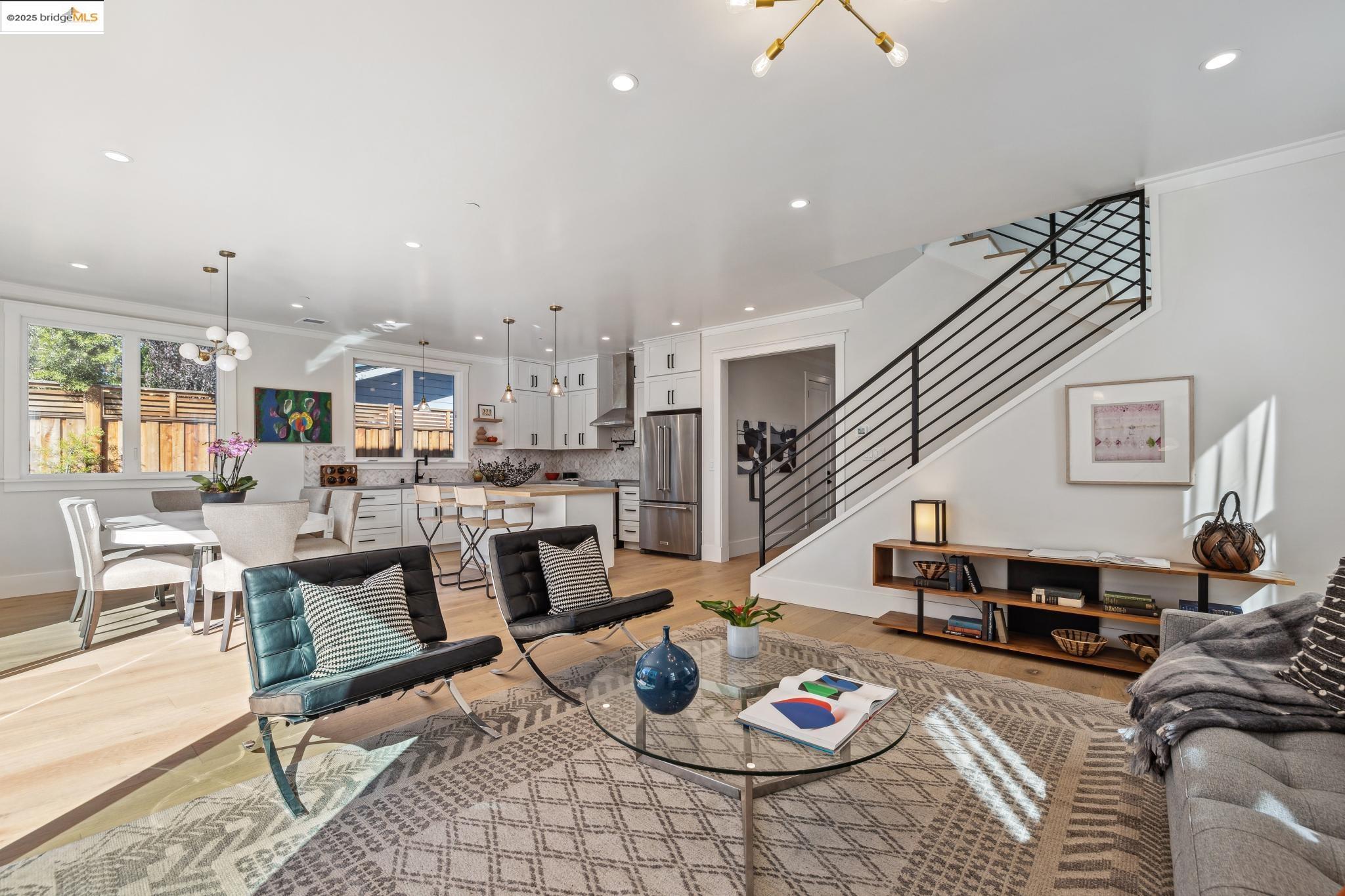2310 Eighth Street Berkeley, CA 94710 - Photo 9 of 44 a living room with furniture kitchen view and a table