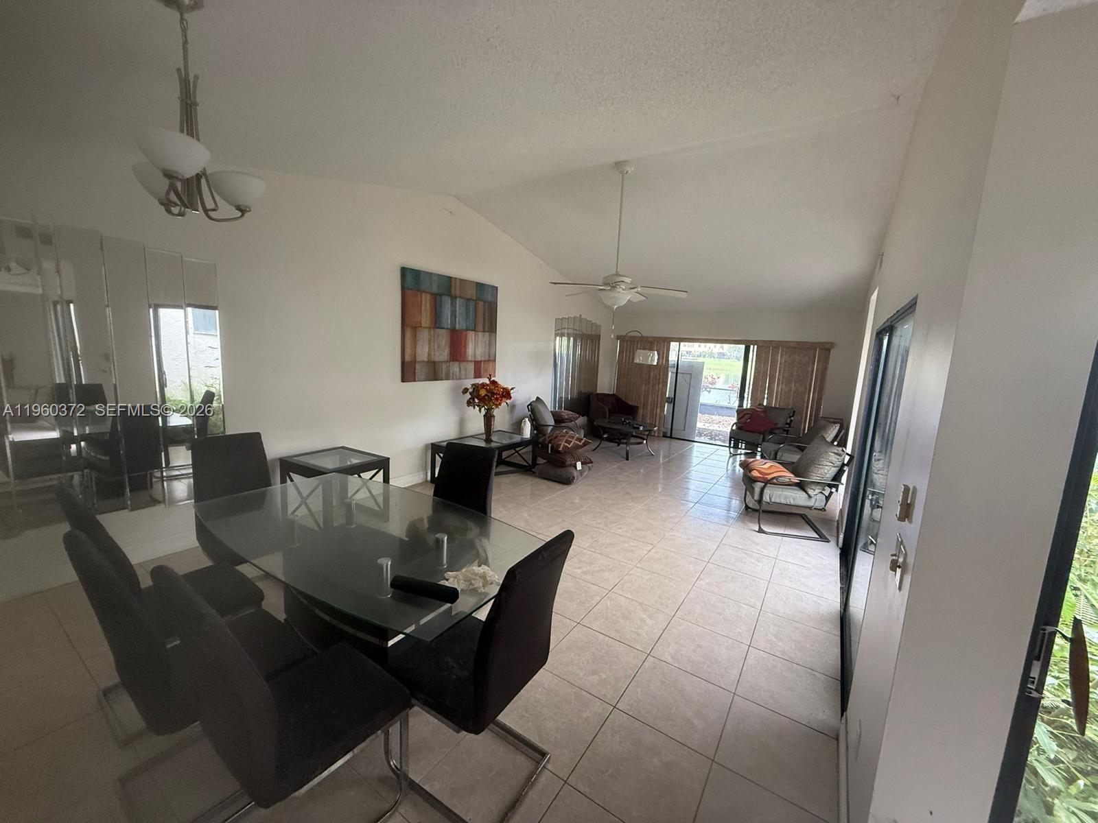 5223 Gate Lake Road, Unit 5223 Tamarac, FL 33319 - Photo 4 of 12 a living room with furniture