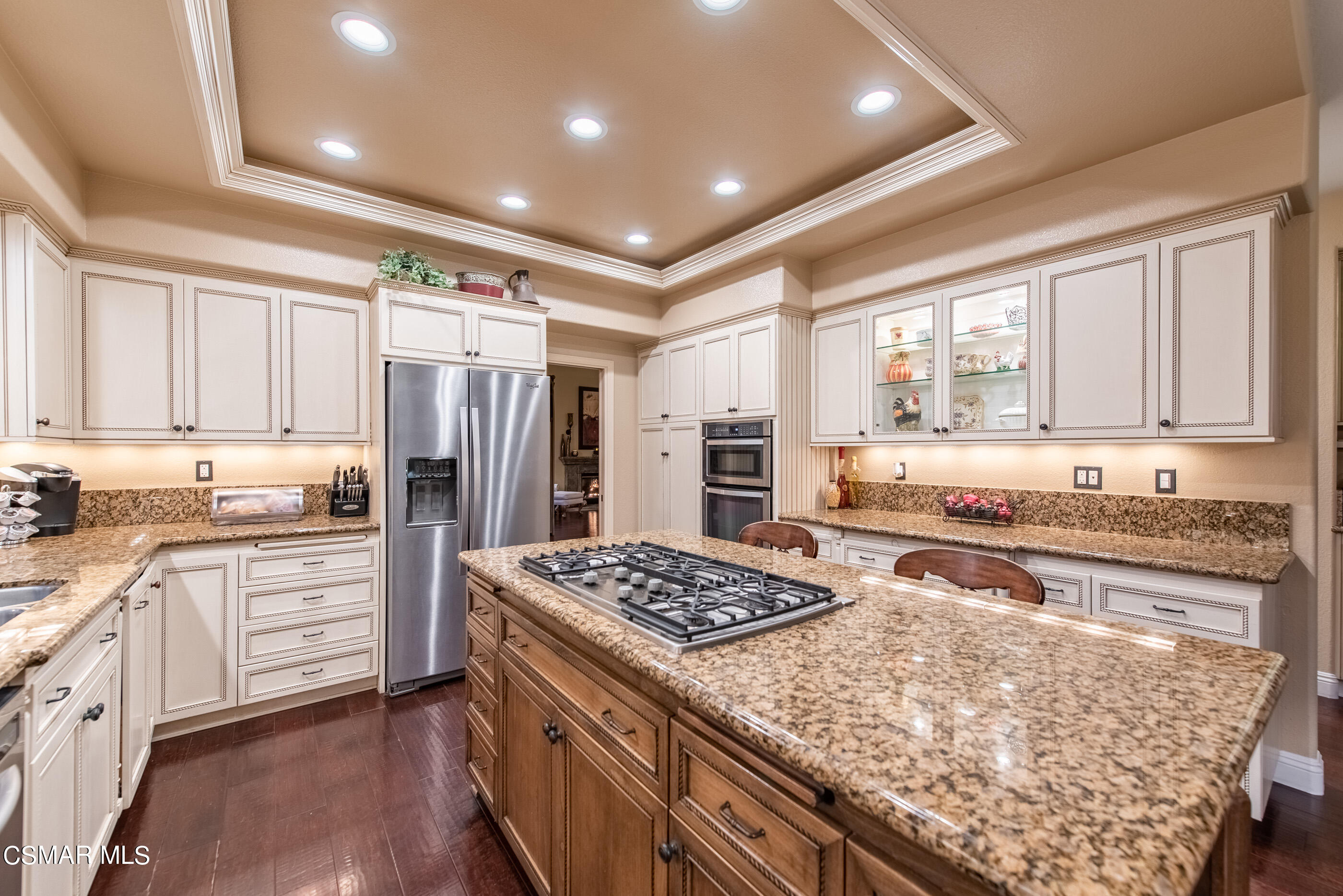 116 Valley Gate Road Simi Valley, CA 93065 - Photo 18 of 59 a kitchen with stainless steel appliances sink stove refrigerator and cabinets