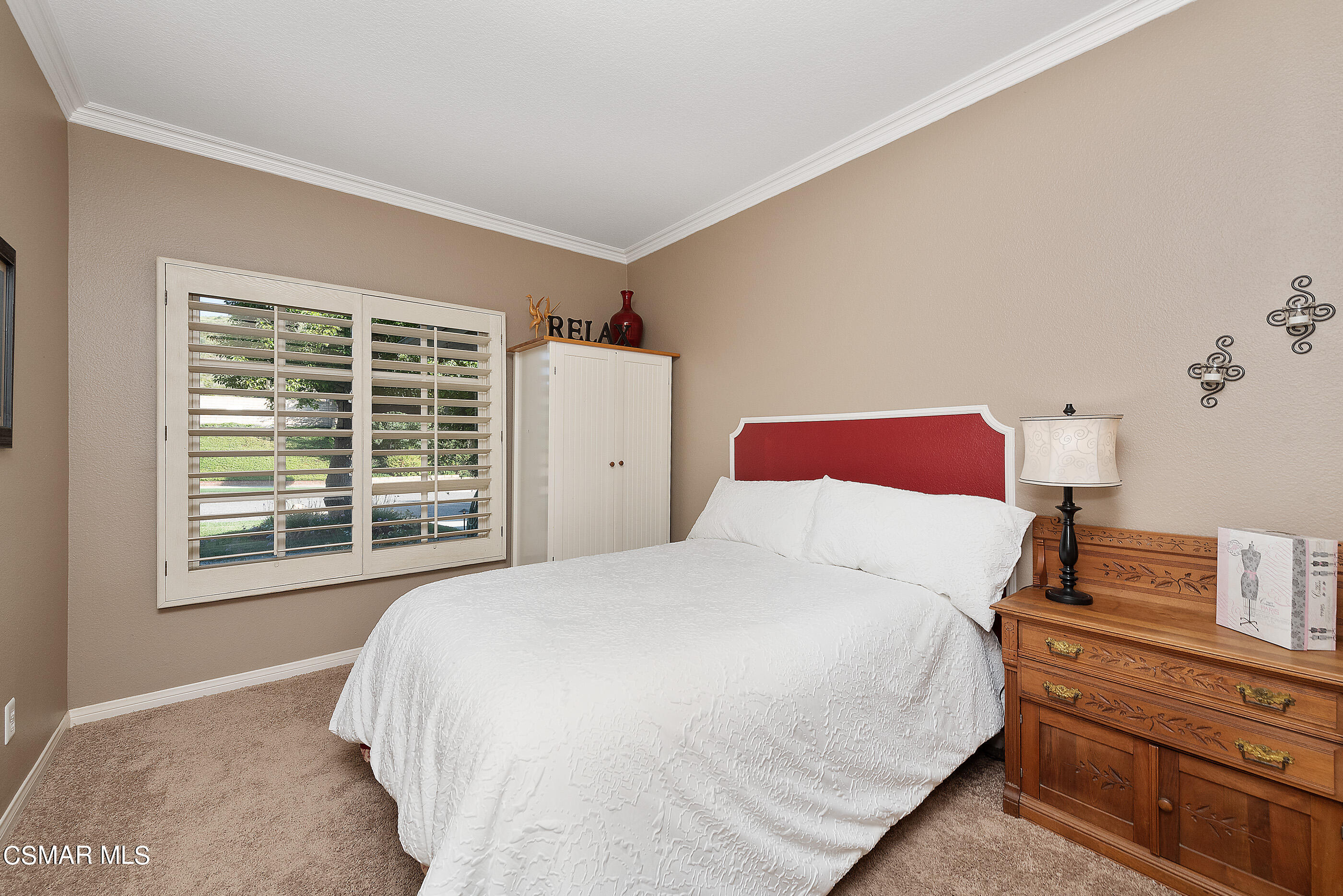 116 Valley Gate Road Simi Valley, CA 93065 - Photo 21 of 59 a bedroom with a bed and a window