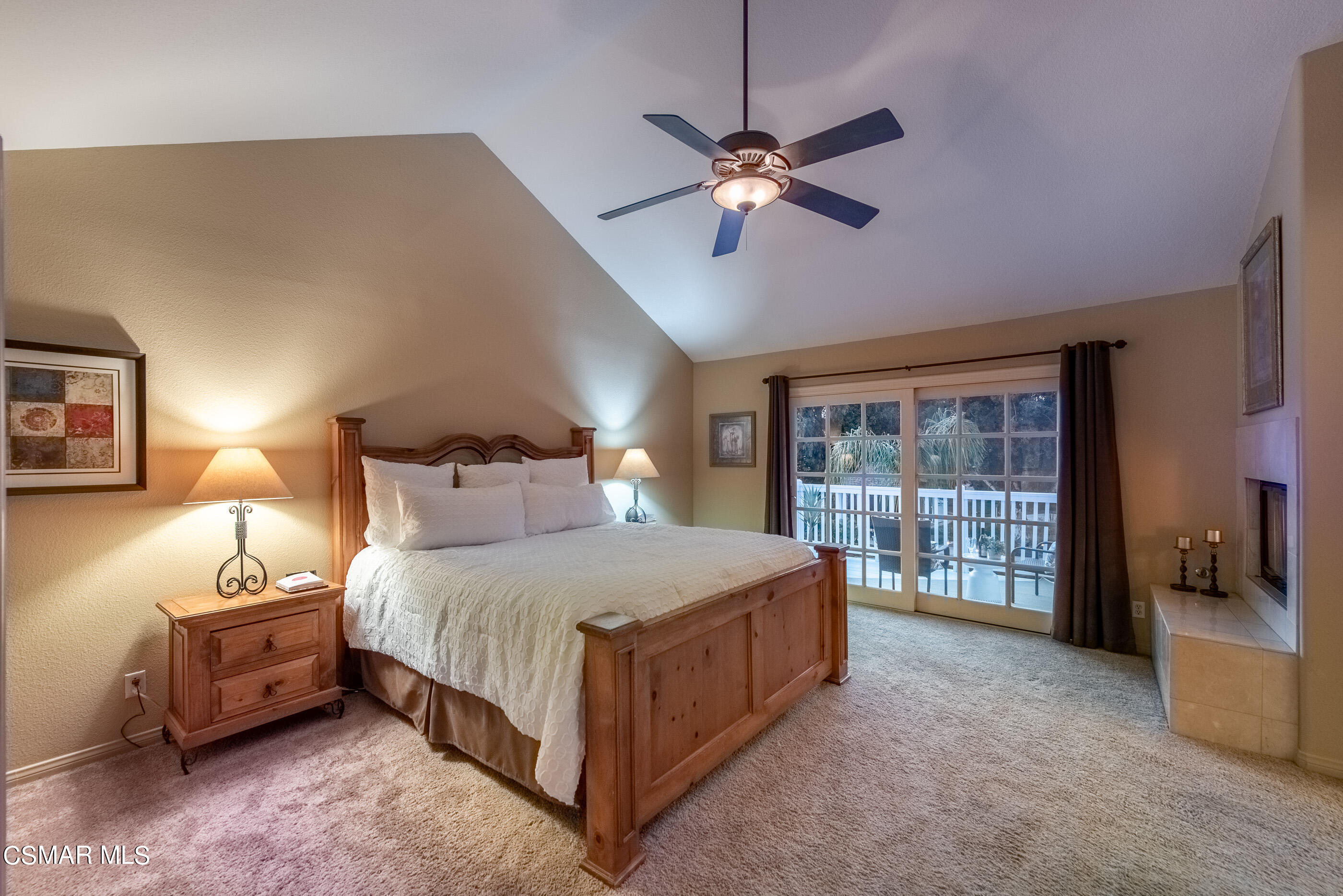 116 Valley Gate Road Simi Valley, CA 93065 - Photo 23 of 59 a bedroom with a bed and a lamp with window