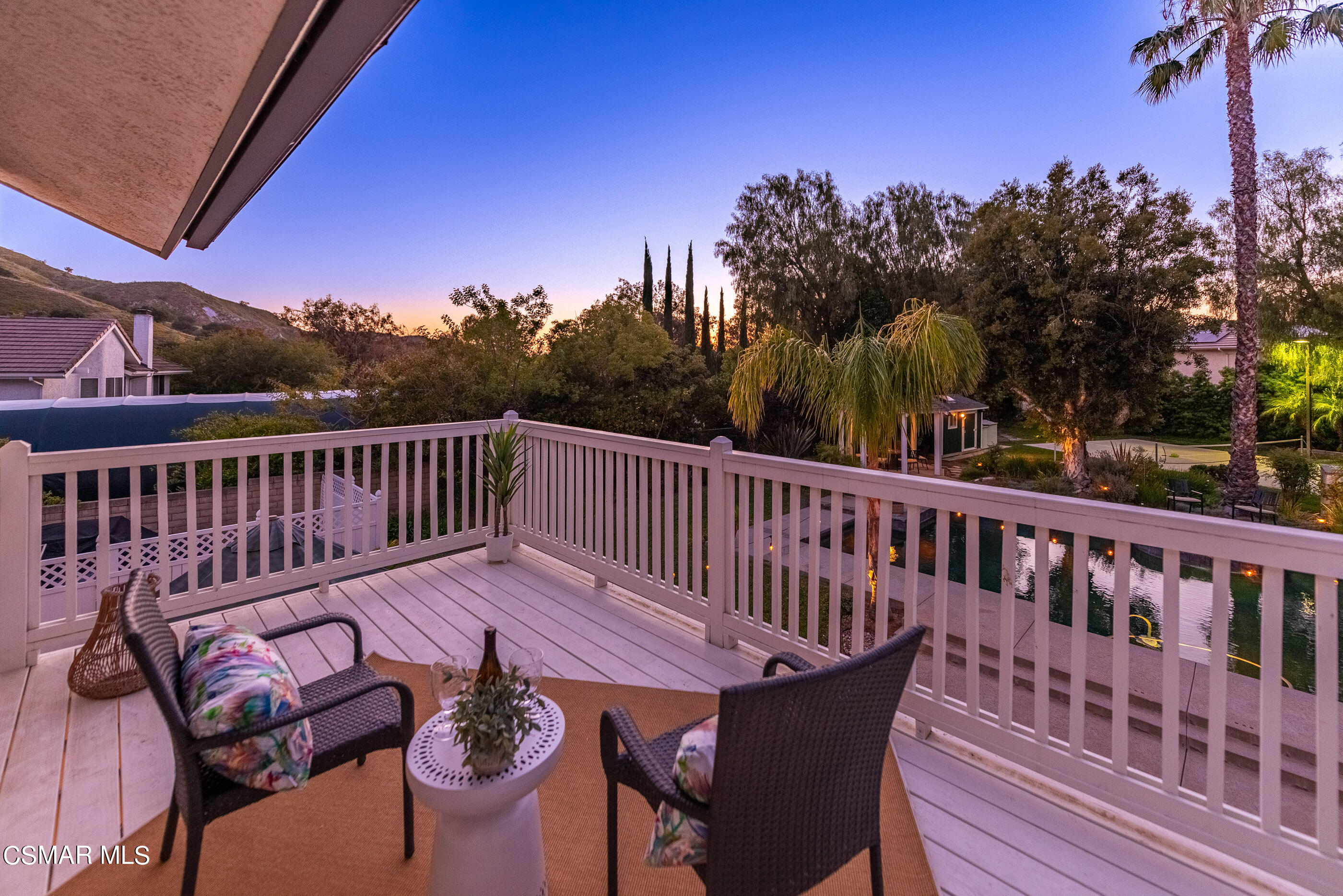 116 Valley Gate Road Simi Valley, CA 93065 - Photo 28 of 59 a view of a wooden chairs on the roof deck
