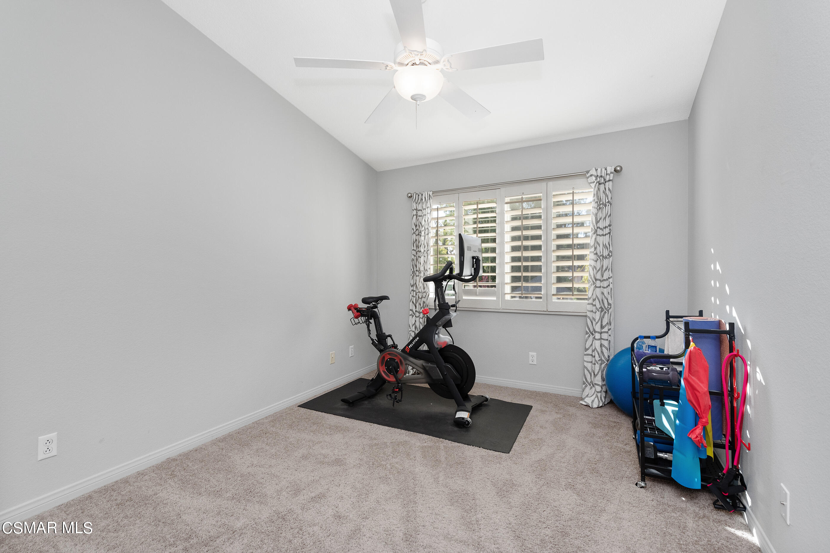 116 Valley Gate Road Simi Valley, CA 93065 - Photo 31 of 59 a room with gym equipment and a window