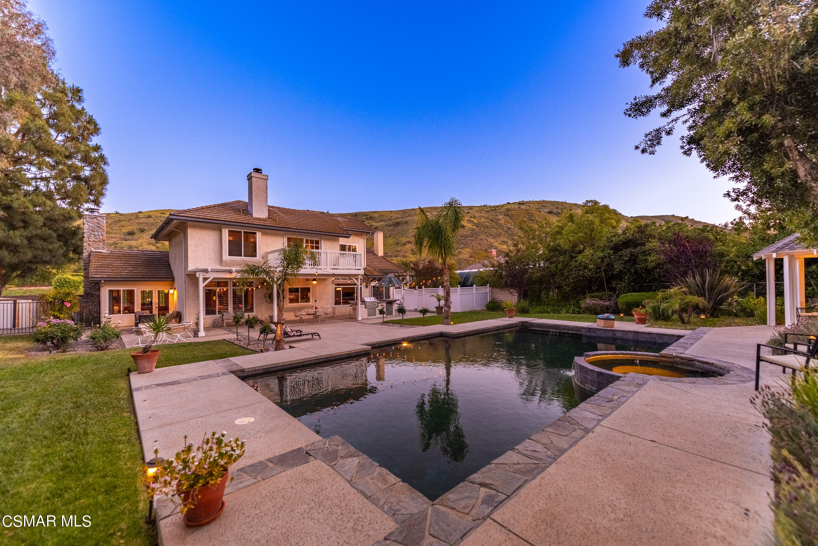 116 Valley Gate Road Simi Valley, CA 93065 - Photo 39 of 59 a view of a lake with a house in the background