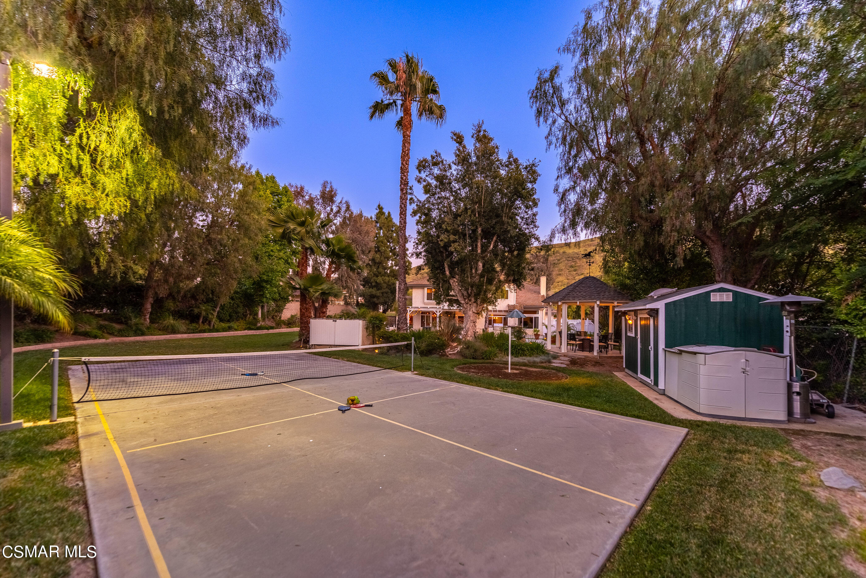 116 Valley Gate Road Simi Valley, CA 93065 - Photo 42 of 59 a view of a house with a yard and large trees