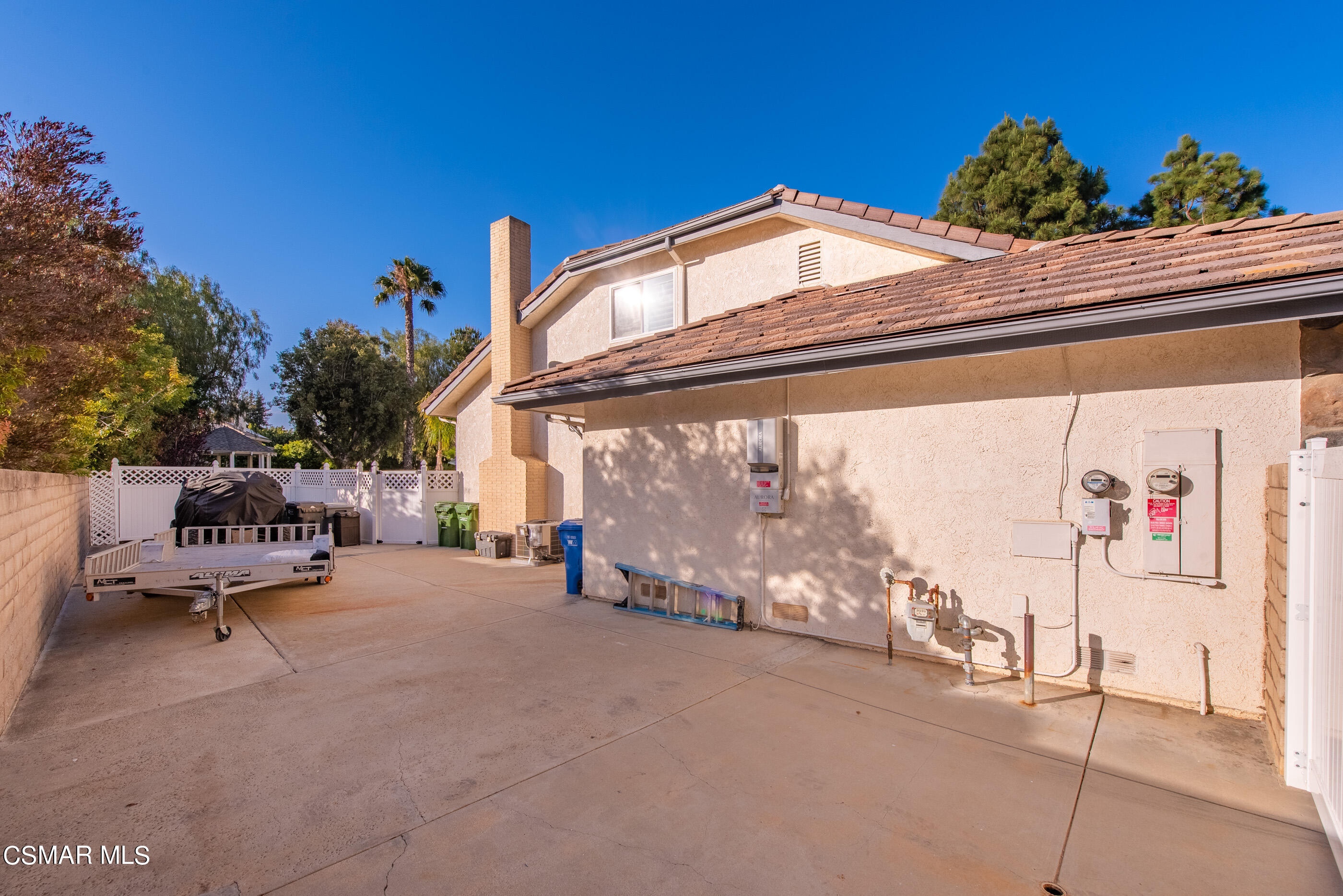 116 Valley Gate Road Simi Valley, CA 93065 - Photo 53 of 59 a backyard of a house with table and chairs