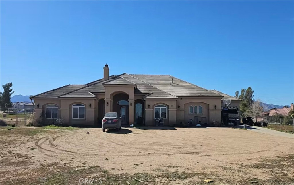 7677 Mono Road Phelan, CA 92371 - Photo 1 of 16 a view of a house with a yard