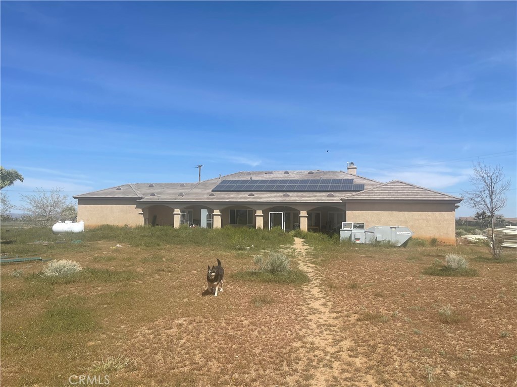 7677 Mono Road Phelan, CA 92371 - Photo 15 of 16 a view of a house with a backyard