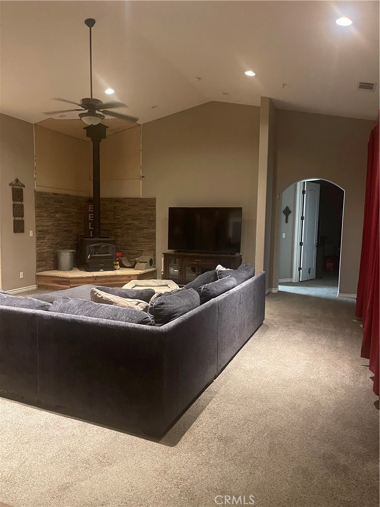 7677 Mono Road Phelan, CA 92371 - Photo 4 of 16 a living room with furniture and a flat screen tv