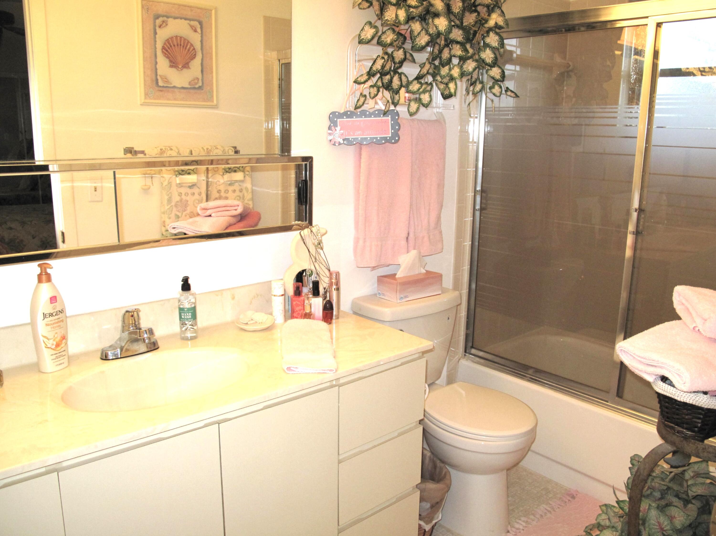 5220 Nesting Way, Unit D Delray Beach, FL 33484 - Photo 18 of 40 Master bathroom