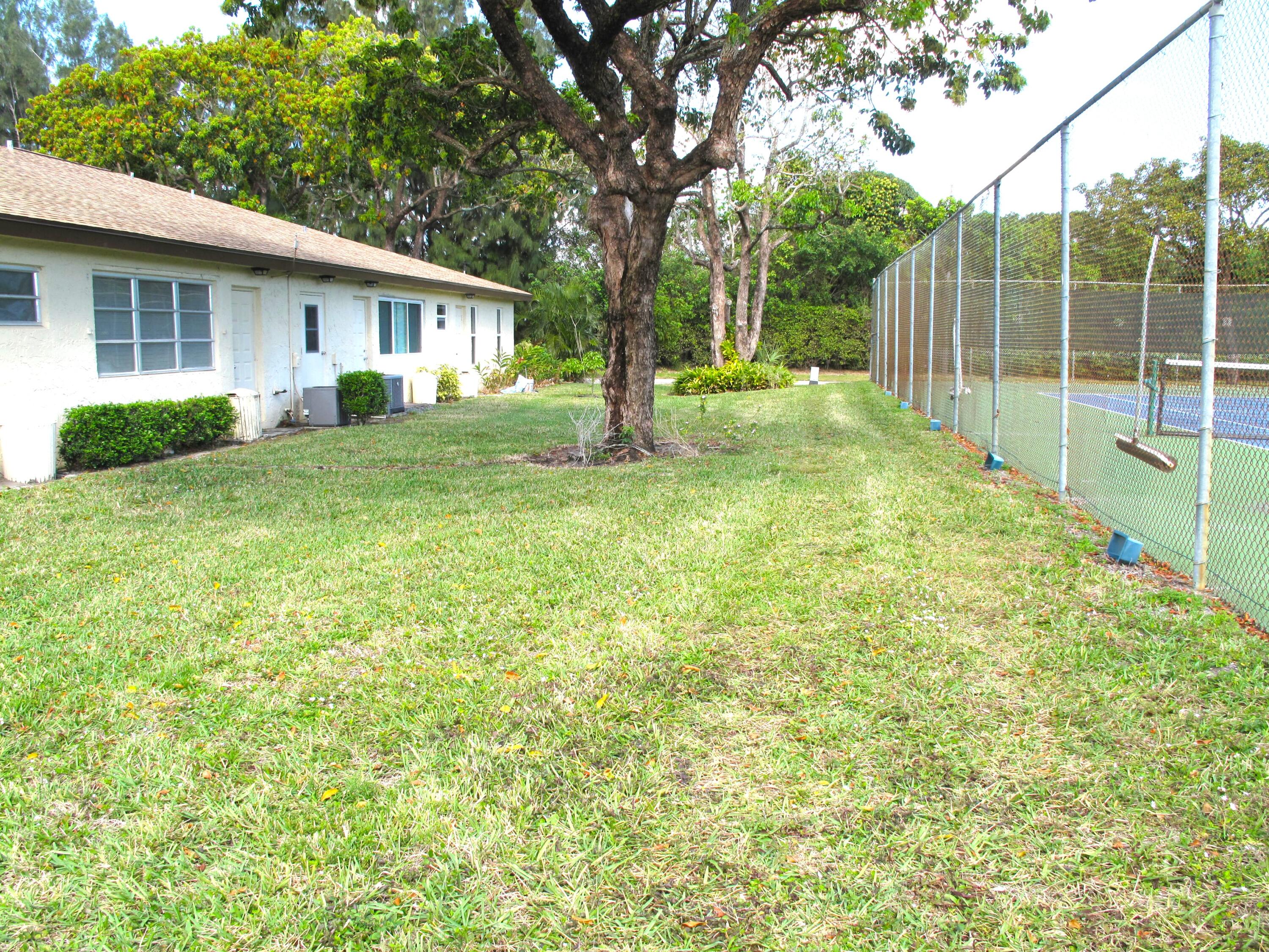 5220 Nesting Way, Unit D Delray Beach, FL 33484 - Photo 24 of 40 Back yard view