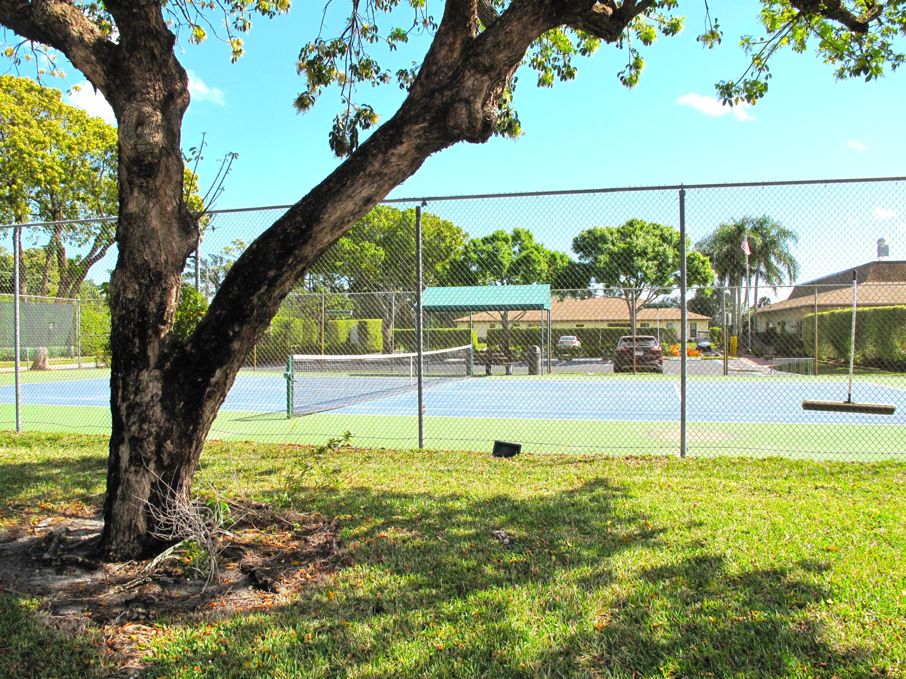 5220 Nesting Way, Unit D Delray Beach, FL 33484 - Photo 25 of 40 Steps to the clubhouse and tennis courts