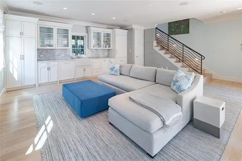 a front view of house with yard and outdoor seating