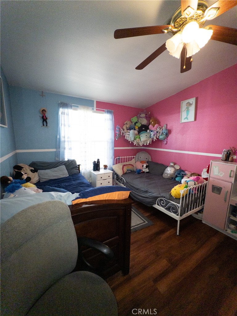 20843 Waalew Road Apple Valley, CA 92307 - Photo 24 of 32 a living room with furniture and wooden floor