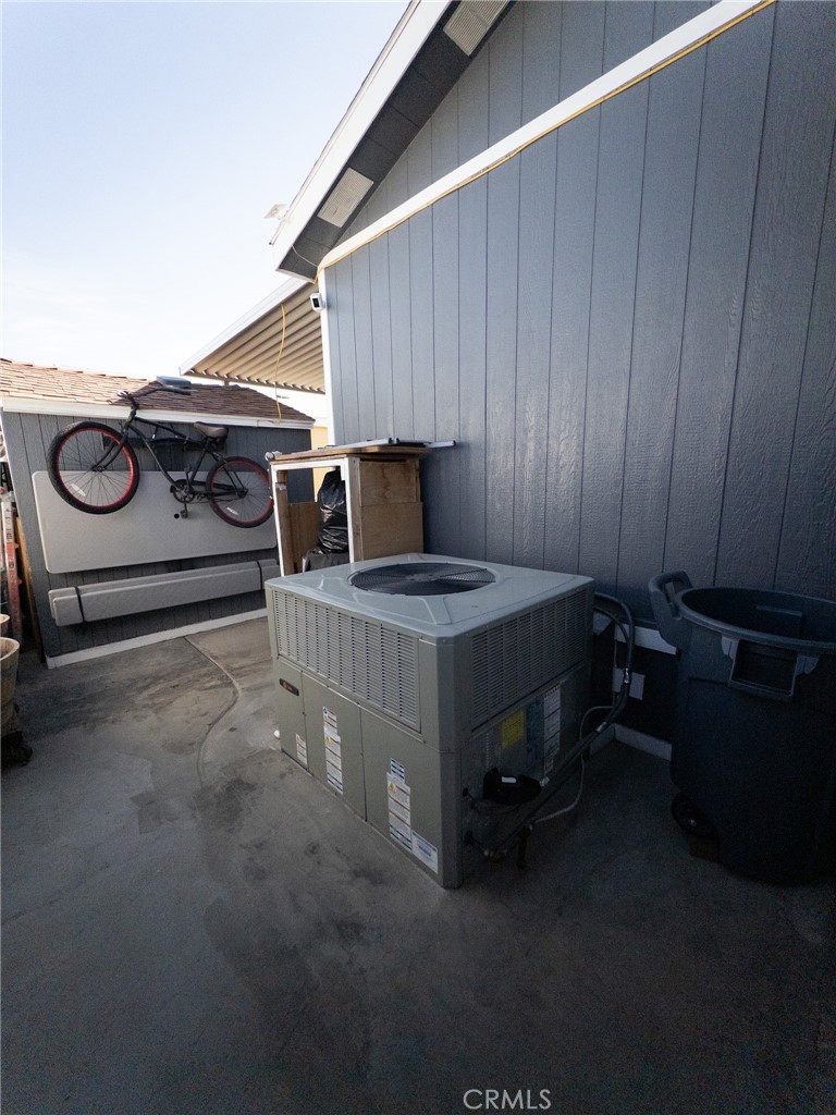 20843 Waalew Road Apple Valley, CA 92307 - Photo 9 of 32 a bedroom with a bed and a dresser