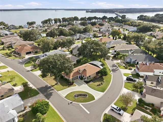 an aerial view of a house with outdoor space